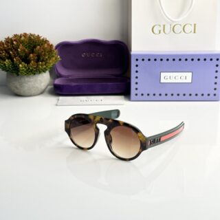 Gucci_0256_Tiger_Brown