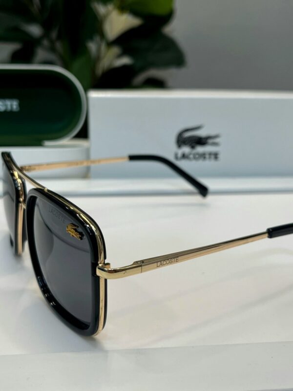 _Lacoste_143_gold_black